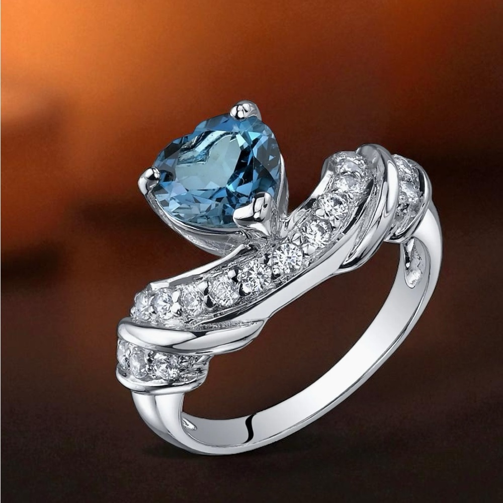 Sterling Silver Heart Blue Topaz and Cubic Zirconia Ring